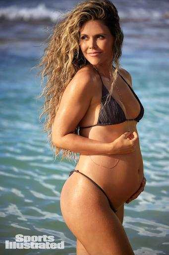 Katrina Scott was photographed by Derek Kettela in St. Croix. Swimsuit by Thaikila. Body chain by Child of Wild.